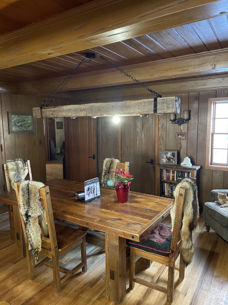 custom light fixture in rustic cabin electrical services